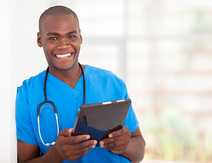 doctor using tablet computer