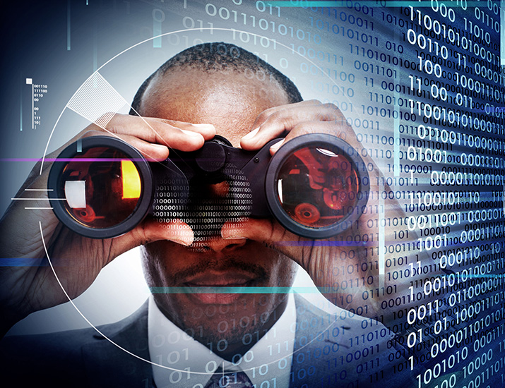 man looking at code with binoculars